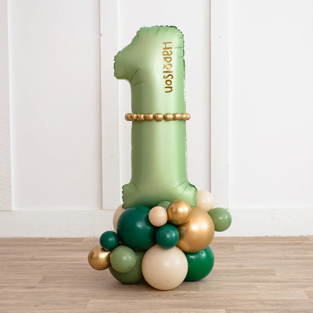 Personalized forest green number 1 balloon with gold and green balloon cluster base