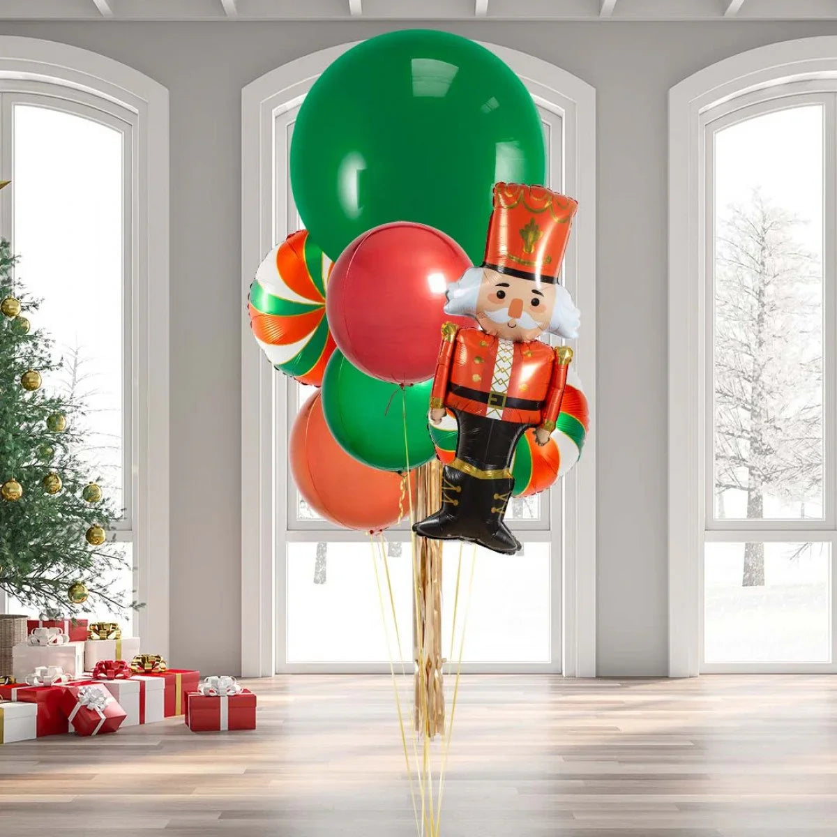 Christmas balloons bouquet with a nutcracker foil balloon, red and green latex balloons, in a festive living room with gifts and decorated tree