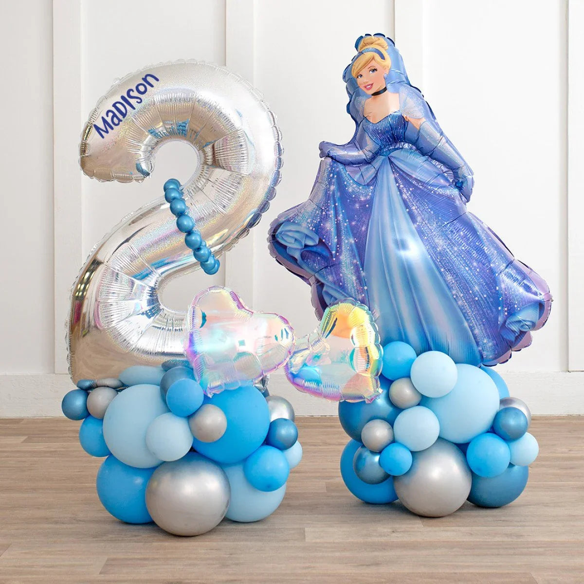 Silver number 2 balloon with name Madison and Cinderella princess balloon on blue and silver balloon clusters