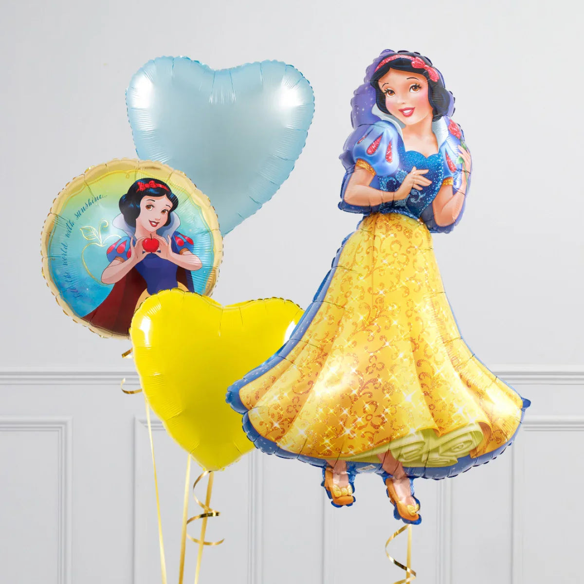 Snow White decorative balloons set including heart-shaped balloons and character balloon in yellow dress