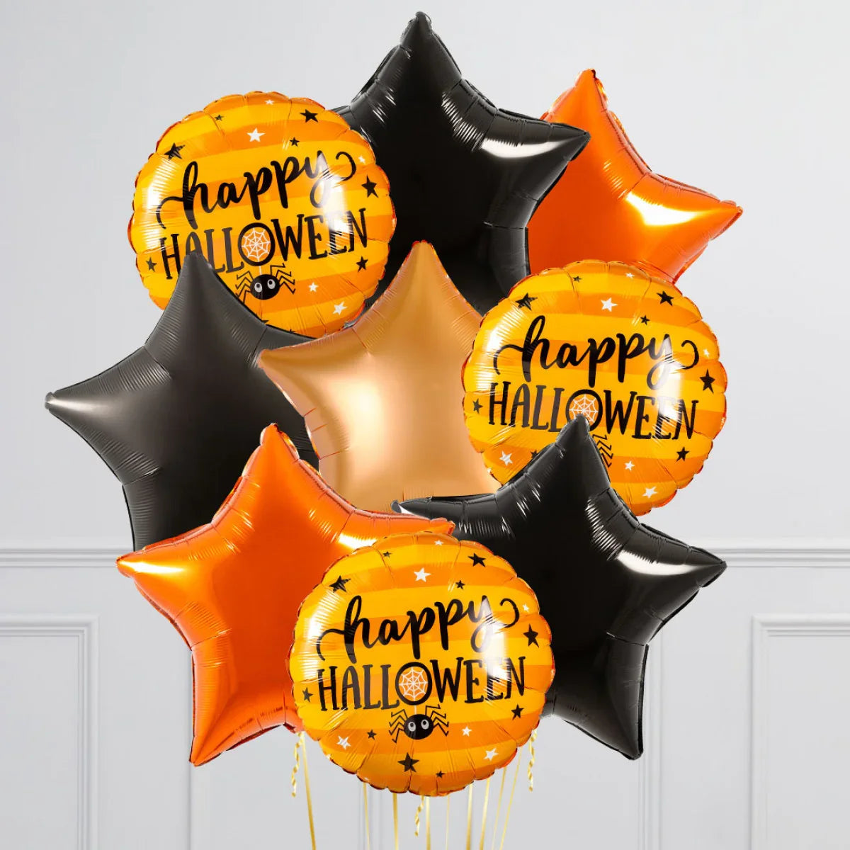 Halloween balloon bunch with orange round balloons saying Happy Halloween and black, orange, and gold star-shaped balloons