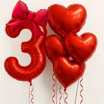Red number 3 foil balloon with a pink bow and four red heart-shaped foil balloons
