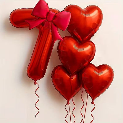Red number 7 foil balloon with pink bow and five red heart-shaped foil balloons for party decoration