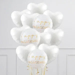 White heart-shaped balloons with gold Happy Engagement text, elegant party decoration