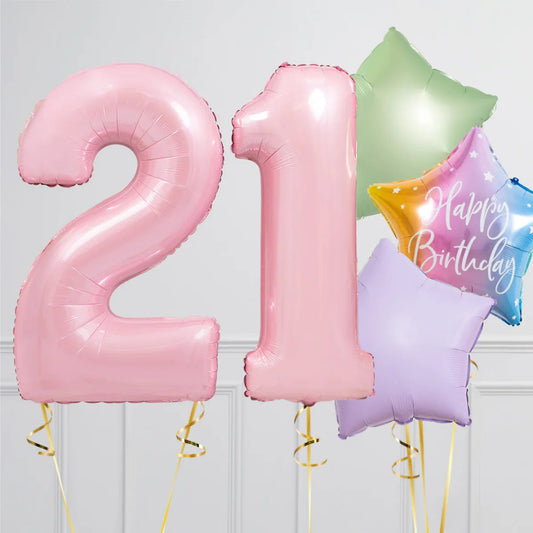 Pink foil number 21 balloons with colorful star-shaped happy birthday party balloons