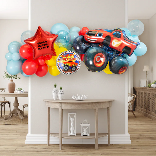 Colorful Blaze and the Monster Machines balloon garland with Happy Birthday and red star message for kids party