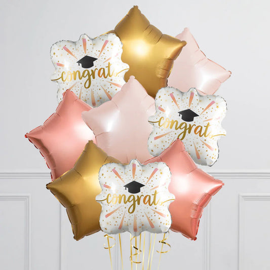 Rose gold, gold, and white 'congrats' graduation foil balloons with star shapes and cap design
