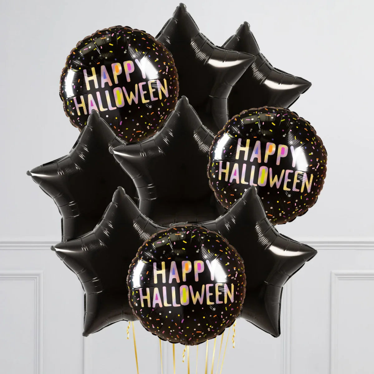 Black foil balloons with "Happy Halloween" text and black star-shaped balloons on white background