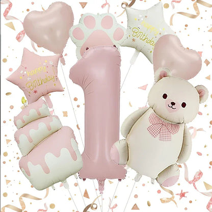 Pink and white birthday foil balloons including number 1, teddy bear, cake, hearts, stars with happy birthday text