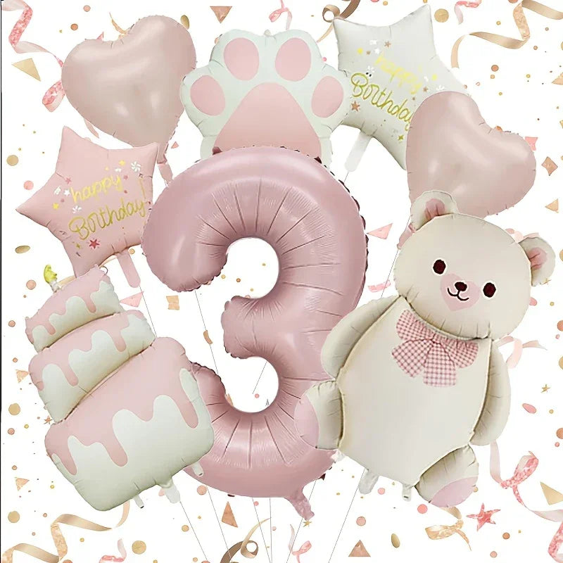 Pink and white birthday party balloons including number 3, bear, cake, hearts, stars, and paw print