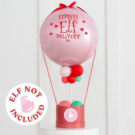 Pink hot air balloon with red text 'Express Elf Delivery' and red, white, green balloons, holiday decoration