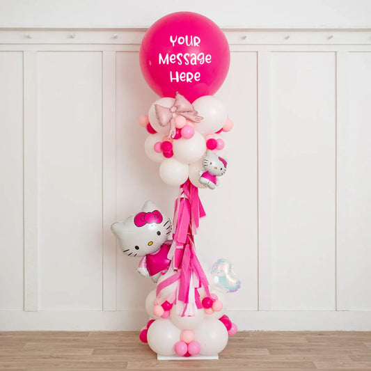 Hello Kitty themed balloon pillar with pink and white balloons and customizable top balloon