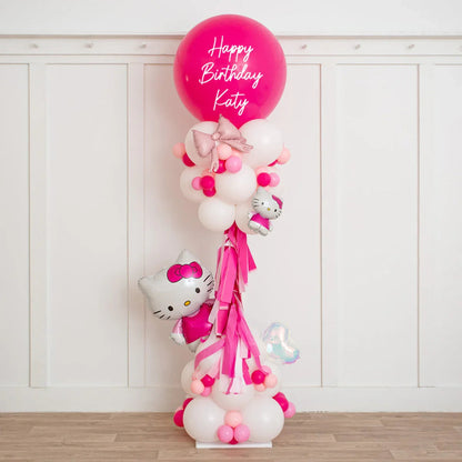 Personalized Hello Kitty pink and white balloon pillar with Happy Birthday Katy message
