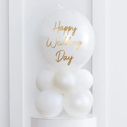 Pearl white air-filled wedding balloon stack with gold Happy Wedding Day text on white background