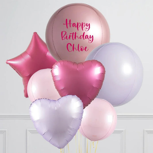 Personalised pink and purple foil balloons including a large balloon with Happy Birthday Chloe text