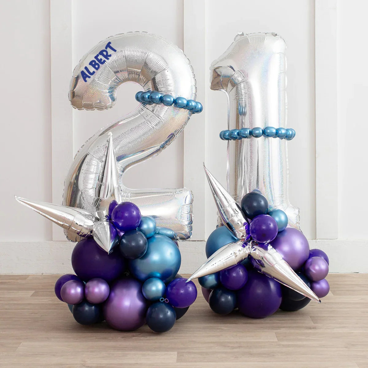 Silver holographic number 21 balloon stack with name Albert and purple-blue balloon decorations