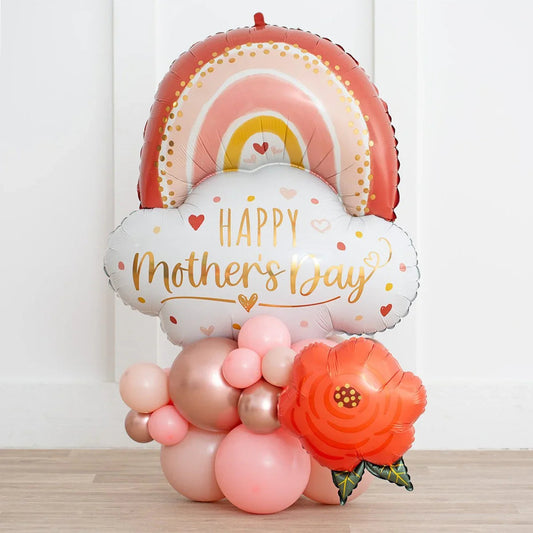 Rose gold and pink balloon arrangement with Happy Mother's Day cloud and rainbow design
