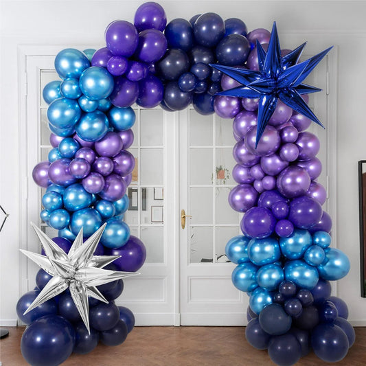 Metallic blue and purple balloon arch with star-shaped balloons decorating indoor doorway