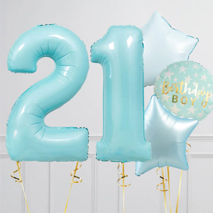 Baby blue 21st birthday balloons with gold ribbons and 'Birthday Boy' star and round balloons