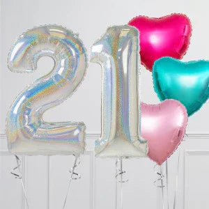 Silver 21 number balloons with pink, teal, and rose gold heart-shaped balloons on white background