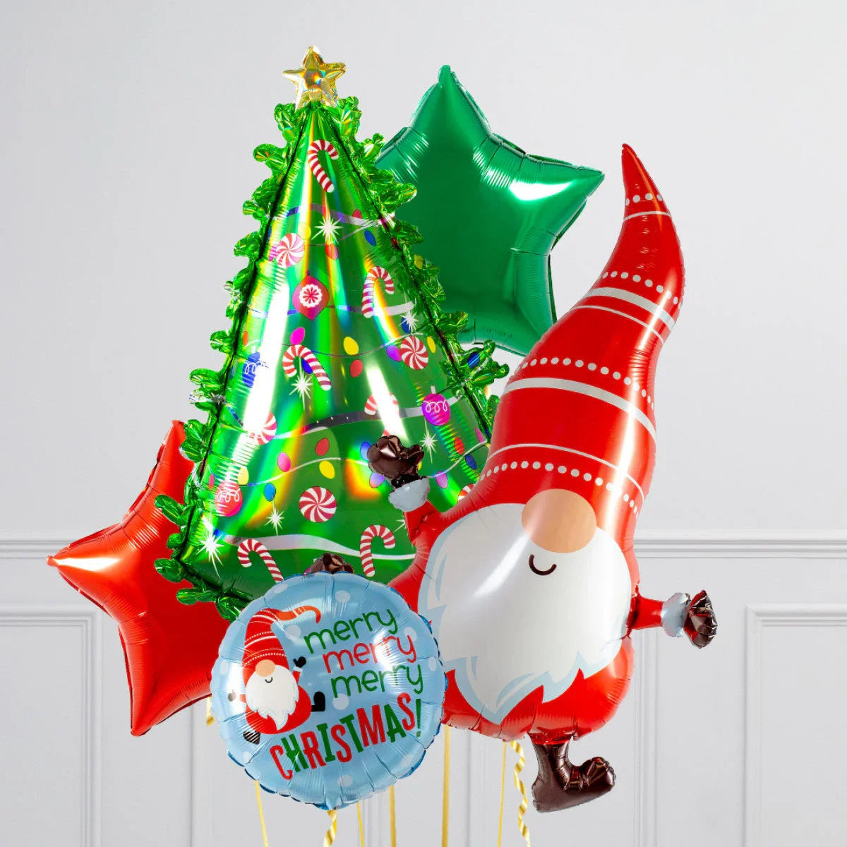 Christmas balloon bouquet with Santa gnome, decorated Christmas tree, green and red star balloons