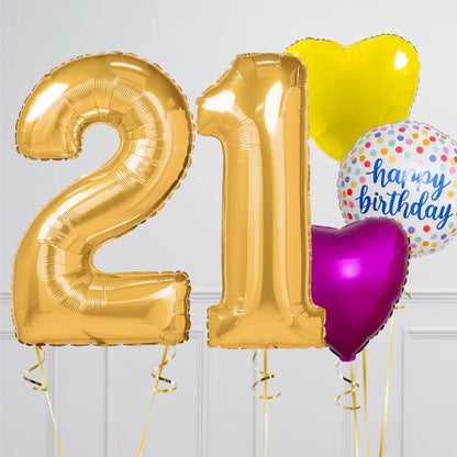Gold foil balloons forming number 21 with colorful heart and happy birthday balloons on white background