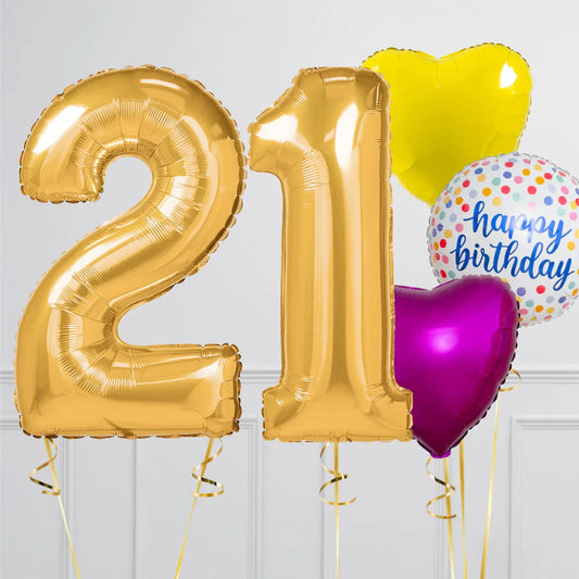 Gold foil balloons forming number 21 with colorful heart and happy birthday balloons on white background