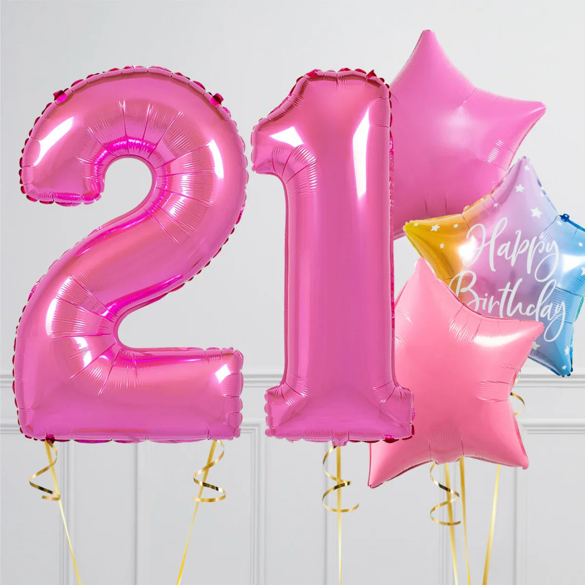 Pink foil balloons shaped as number 21 with pink and multicolor star birthday balloons