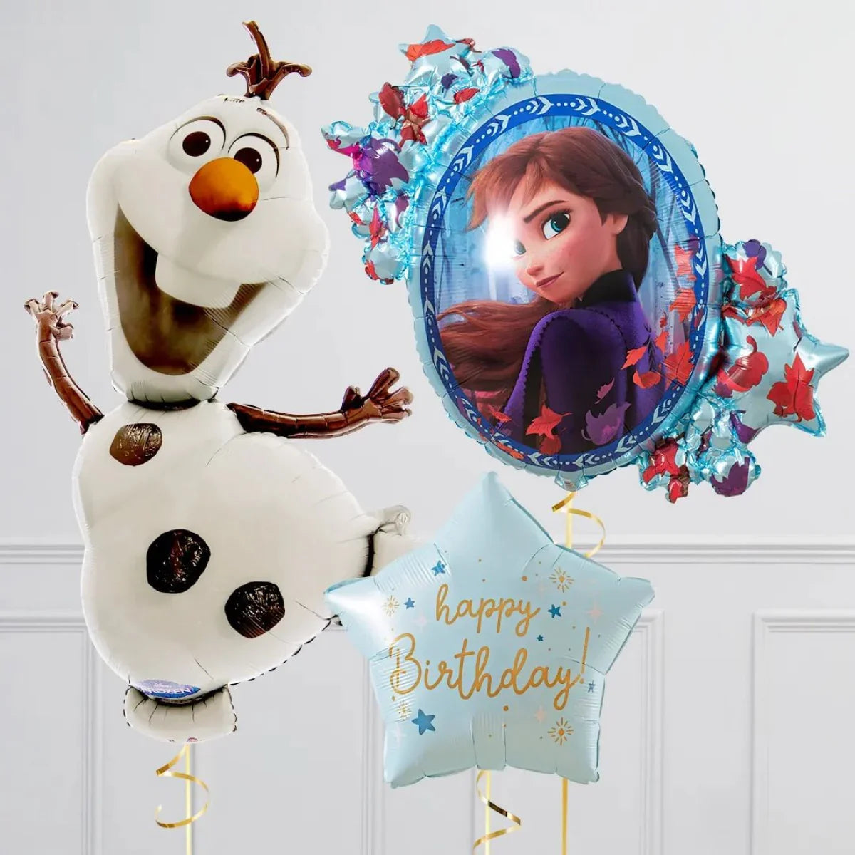 Frozen-themed birthday balloons featuring Olaf snowman, Anna portrait, and a star-shaped happy birthday balloon