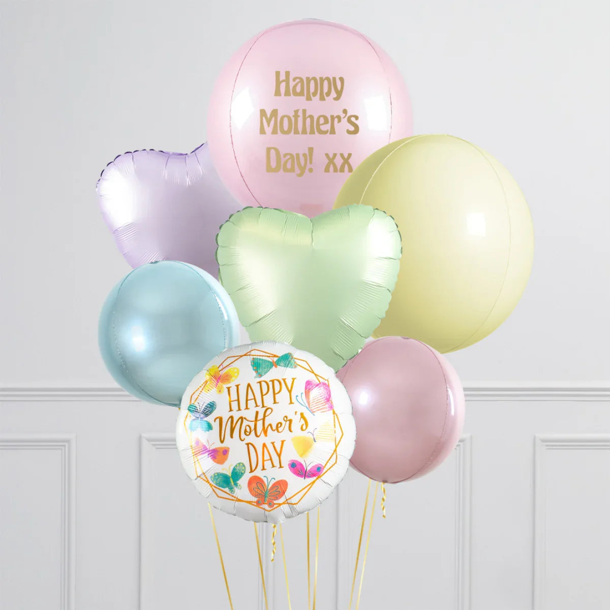 Pastel Mother's Day balloons bouquet with messages, hearts, and butterflies decoration