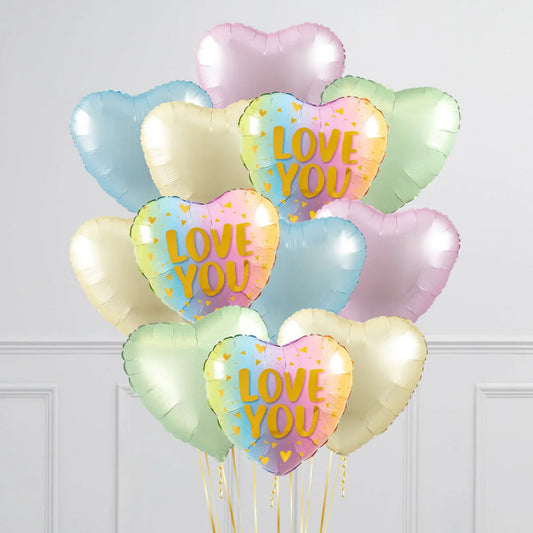 Colorful heart-shaped balloons with three pastel rainbow "LOVE YOU" balloons and other pastel blue, green, purple, and cream balloons