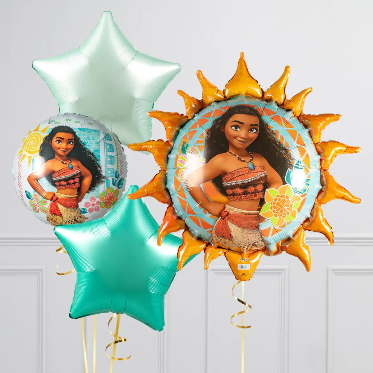 Decorative party balloons featuring Moana character with sun and star shapes in teal and orange colors