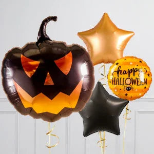 Halloween balloons including a black jack-o-lantern, gold and black stars, and an orange happy Halloween balloon