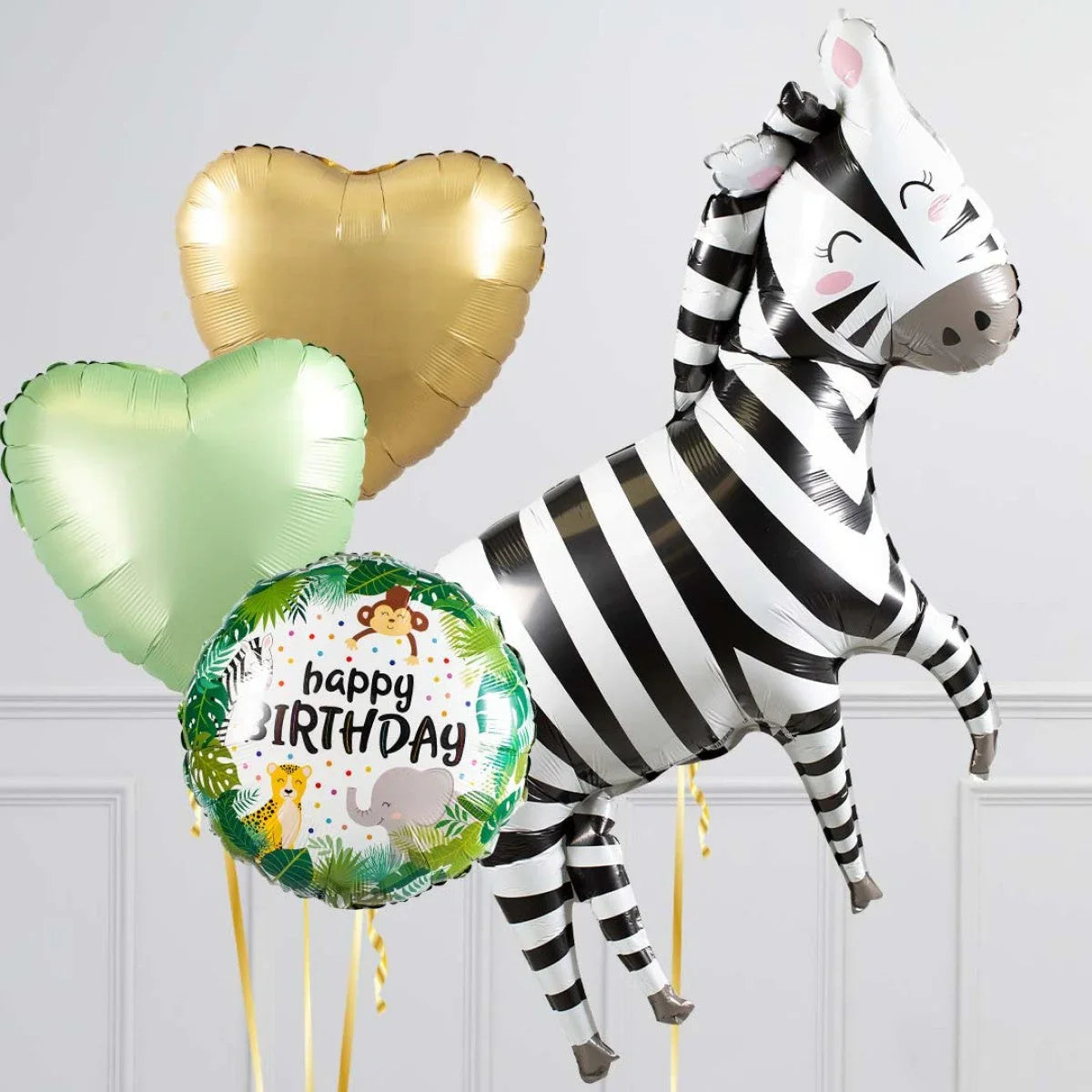 Happy Birthday balloon set with large zebra-shaped balloon, two heart-shaped balloons, and jungle animal-themed round balloon